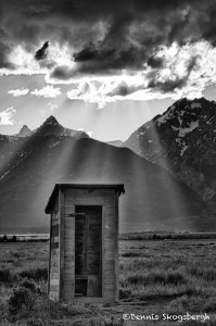 1301 Crepuscular rays ('God beams') on outhouse, Grand Teton National Park,WY